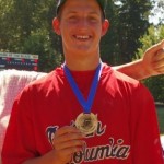 Alex Fraser, son of Julia Fraser, Holds his silver medal from the  BC summer Games