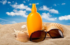 Sunscreen-and-Sunglasses-on-the-Beach