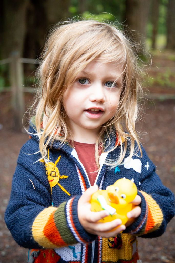 Small child with Accent Inns duck