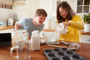 Mother and son bake together