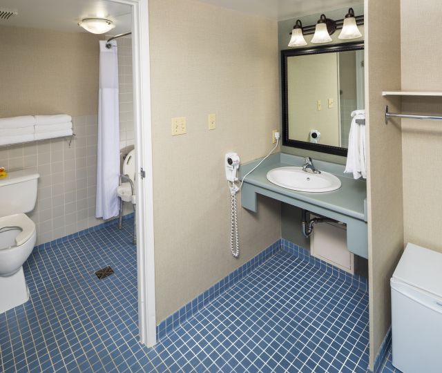 One Queen Accessible Washroom