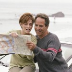 Explore BC picture of a couple holding a map
