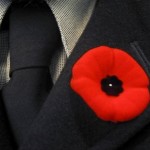 remembrance-day-poppy poppy on a jacket representing Accent Inns bc hotel poppy campaign