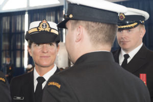 Honorary Captain (N) (HCapt (N)) Mandy Farmer inspects a member of Alpha Platoon during the Canadian Forces Base (CFB) Esquimalt’s Base Divisions held at the Naden Drill Shed on 27 September 2016. Image by LS Ogle Henry, MARPAC Imaging Services ET2016-0362-03 © 2016 DND-MDN Canada
